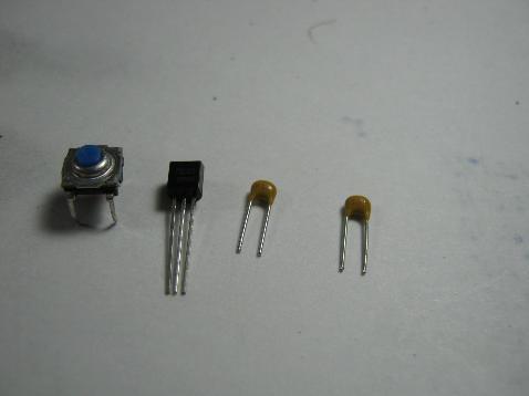 1uf capacitor (marked 104) Caution: When installing the tact switch, it is NOT square!