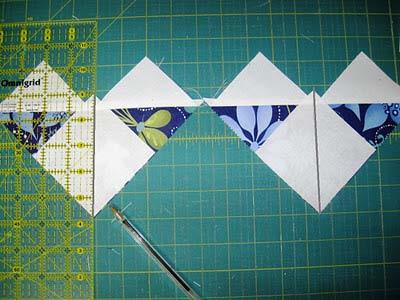 squares and align them on your two stitched pieces as follows with