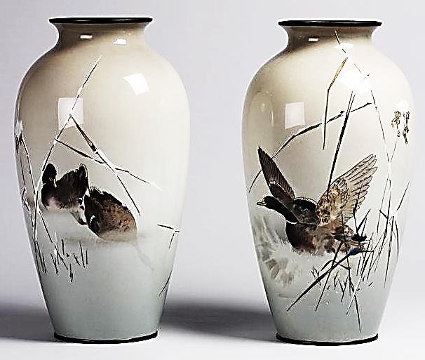 Vases with ducks in the snow