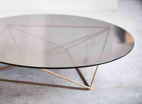 THALES coffee table The THALES coffee table comprises of a solid bronze rod base and a natural stone or glass top.