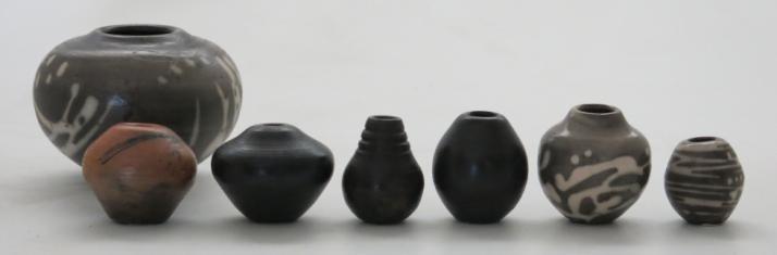 262-16 and17 16-very black Carbon Trap Naked Raku Mini, 4.6x6.1cm (1.8x2.4in) 17-medium grey Mini with white swirls around 3 indents, 6.1x6.1cm (2.4x2.