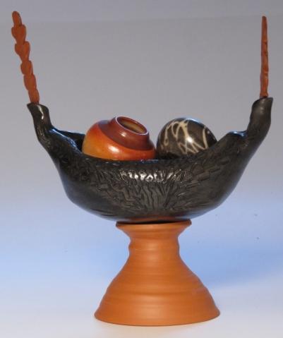 245 Round very black carbon trap vase. 5x7cm (2x2.75in) $35 241 $55 Round lustrous autumn orange/cream mini vase 10x12cm (4x4.