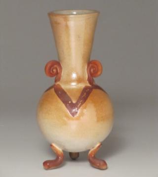 207R Victory Vase Vase with tall neck, round belly, 3 red/brown legs and spiral handles and V neck