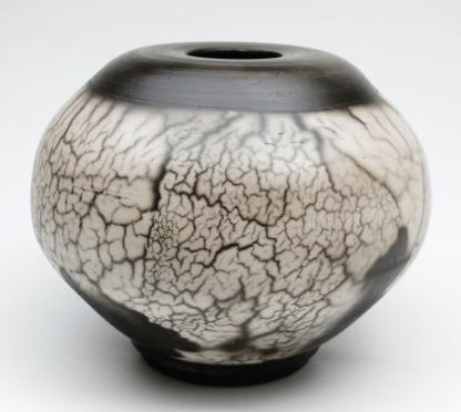 $250 176R Naked Raku Vase Black and white very round vase with crisp and soft, medium to large Naked Raku slip resist