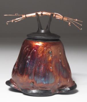 carbon trap lidded container with a large marble inside and suspended on a solid copper rod on the boat 30.5 high x20.5 long x15cm wide (12x8.