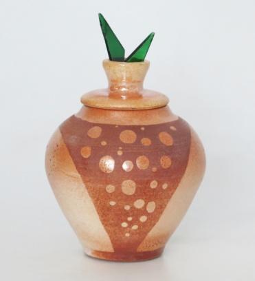 ) NO LID-$68 410 $62, toasty orange on rounded shoulder and cream lower portion with fiddler s bow horsehair carbon painted patterns on a vase form.