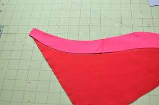 Line up the raw edges of each fabric (where the arrow is pointing) and sew together.