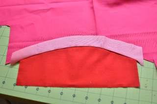 Using the light pink fabric as a guide, I cut the darker pink fabric and