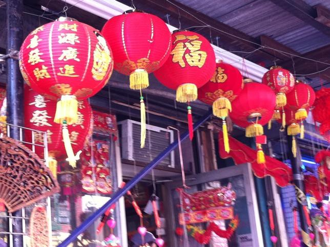 Red lanterns are very common to Aind in Chinatown, and these lanterns have gold Chinese characters. Although not all Chinese Lanterns are just red, some are very colorful!