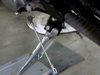 Attach the left rearset to the rearset bracket with