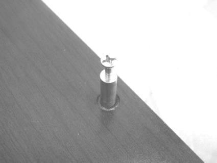 Attch three metl dowel screws (2)