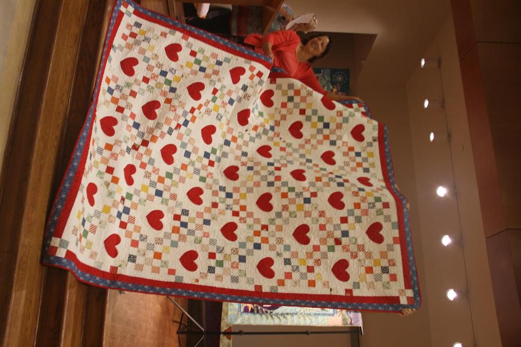 All My Heart or Todo Mi Corazon - Made by Liz Pickering & quilted by Mary Anne Sletto of Harmony Quilting Liz made this queen sized Double Irish Chain quilt for her Mom and Dad.