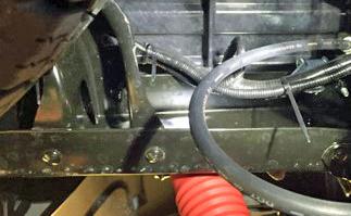 spare tire. Use two wire ties to secure the bed light main wire harness to the vehicle factory harness (Fig. 8-3 & Fig.