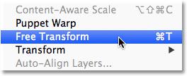 Or, I could press Ctrl+T(Win) / Command+T (Mac) on my keyboard to select Free Transform with the shortcut. Either way is fine: Going to Edit > Free Transform.