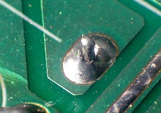 An acceptable solder connection should indicate evidence of wetting and adherence when the solder blends to the soldered surface.