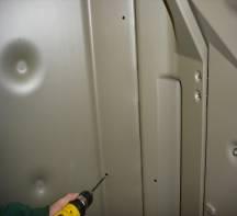 careful not do drill through outside wall of panels". (See pic.
