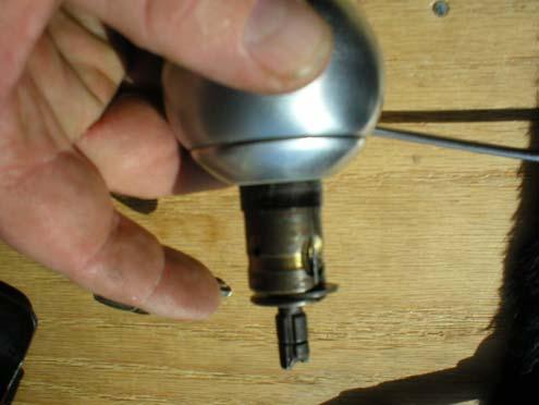 the knob to the shaft. Make sure the pin is in the lock mechanism.