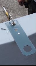 Installing Safety Hooks: Line up and clamp the safety hook roof sections together.