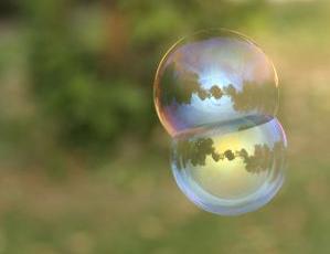 Soap bubbles are round, beautifully round, a perfect shape, as in Figure 1a.