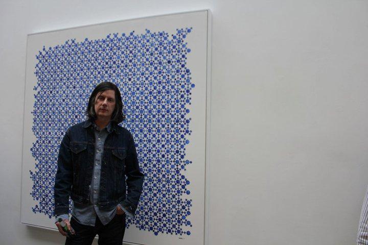 John Squire shot in front of the 'John F. Kennedy' artwork. "I see him [JFK] as the first reality TV star, with the election debates, the assassination, the funeral.