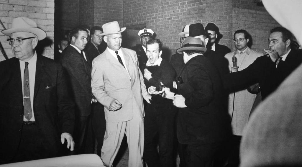 Here he comes, here he is... He s been shot, he s been shot. Lee Oswald has been shot. Then it was just a question of finishing off the job.