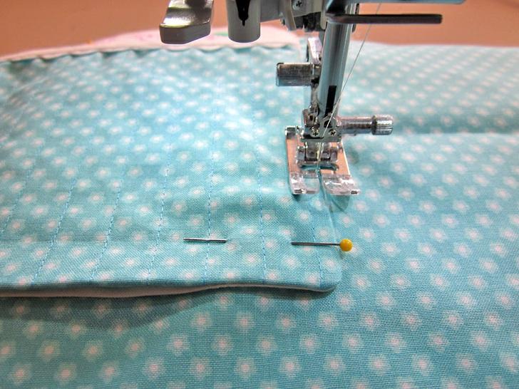Stitch along the sides and across the bottom. Leave the upper edge of the pocket open. This stitching closes the opening left for turning in the bottom of each pocket.