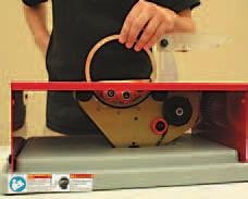Loosen belt tension knob and move tension slider control down and retighten to adjust belt