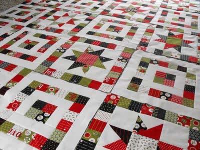 Sew your blocks into rows, and then your rows into your completed quilt top! To make your quilt backing, simply cut your red reindeer yardage in half then sew together lengthwise.