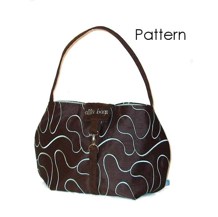 Ariel Hand Bag Pattern By Aimee Larsen for HomeSpun-Threads Materials: 1 Yard inside fabric 1 Yards Outside Fabric ¼ Yard for Straps and Flap 1 Yard Heavy Fusible Interfacing 1 D-Ring & Clip