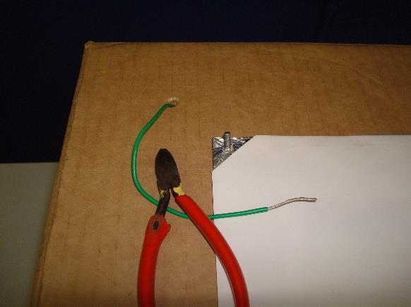 Position the envelopes in roughly the desired location so you can see how long to cut the wires.