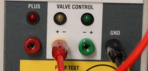 The four test jacks are connected to the wires controlling the valve coming from the display. LED light up indicating voltage present on the individual wires.