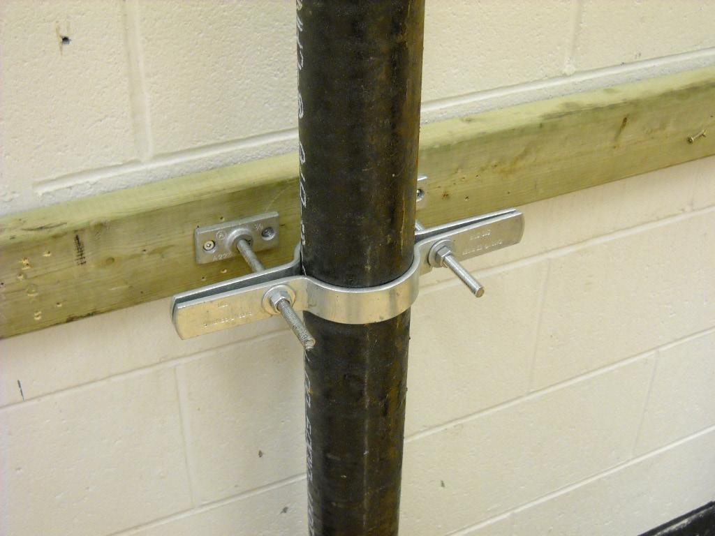 Plumber Figure 16 Vertical piping can also be supported by a riser clamp. Evaluation Guidelines Quality of M.J.