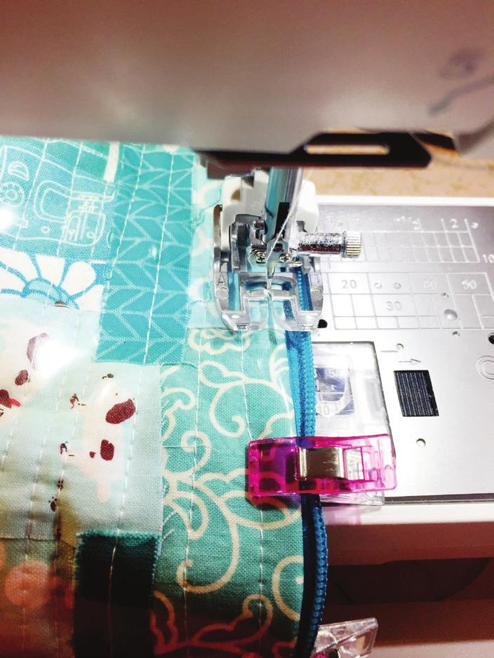 I ve never sewn on vinyl before, and I didn t quite know how it was going to work out. We used binding clips instead of pins to hold everything together.