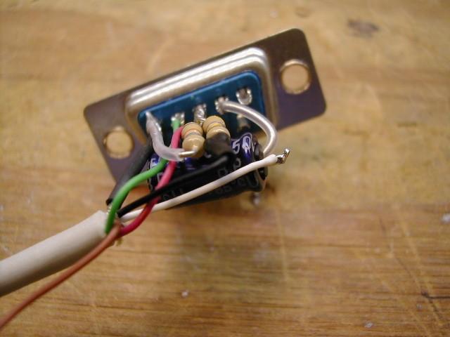 Be sure to use plastic sleeving over the bare lead of the capacitor to avoid a short circuit.