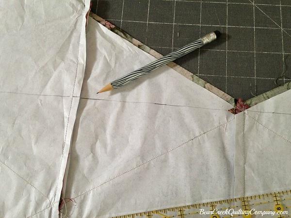 Squaring up the quilt center: Tip: Do you still have the paper attached?