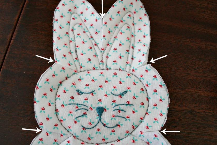 the outside of the bunny being careful not to snip through the sewn