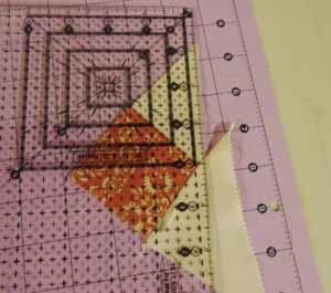 Sew them to the right and left side of these burgundy squares. Trim away excess leaving a 1/4" seam allowance.