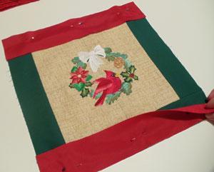 To prepare the fabric for the outer and inner center borders, cut three pieces of fabric to 13 3/4 wide by 2 1/2 high.