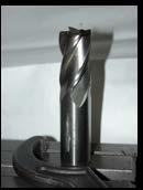 Use a ¾" or larger 4-flute end mill.