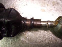 Re-using the OEM steering rack boots - Utilize your OEM tie rod boots. They will require some careful trimming around the small end of the boot.