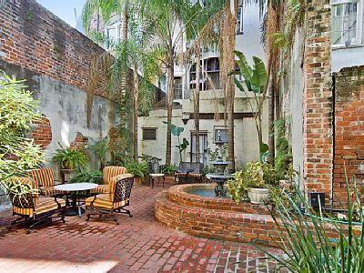 Private balconies and a shared, secure courtyard ensure the ambiance unique to French Quarter