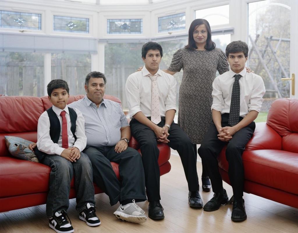 What makes somebody Scottish? 3 sessions Verena Jaekel, Mona Siddiqui with her Family, Dullatur, 2010. From A Scottish Family Portrait series.