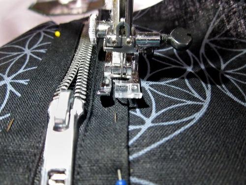 14. When done there should be four seams the length of the inset. Back zipper 1.
