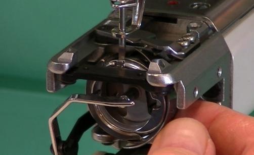 Guide the point of the Rotary Hook into the slot on the back of the RhAT Adjusting Tool.