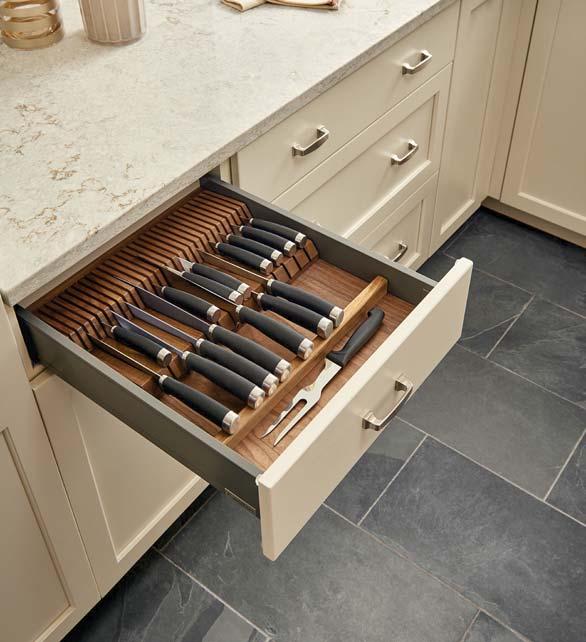 for drawers from 12 1/2 to 18 1/2 Trim-to-fit existing drawer Drop-in installation Walnut construction with satin finish (1) compartment and (2) tiers that include up to (55) knife slots