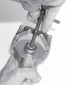 Using a puller part #807-76 (Figure 7, item ), remove and discard bearing. Figure 7 Figure.