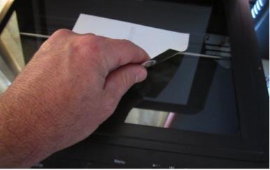 Scanning A scanner is a device that uses a light source and image sensor to digitise flat objects. Some will also scan transparent film such as slides and negatives.