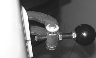 4. The bottom lock knob located on the boom mount channel may need to be adjusted.