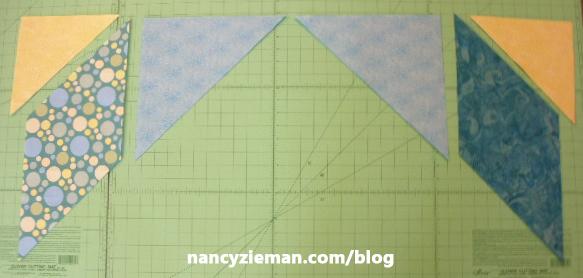 Stitch Group One: Align right sides and diagonal edge of small half square triangle (template A) and diamond (template B).