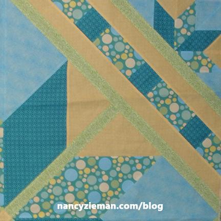 Quilt and finish Layer the backing, batting, and quilt top. Baste the layers together.